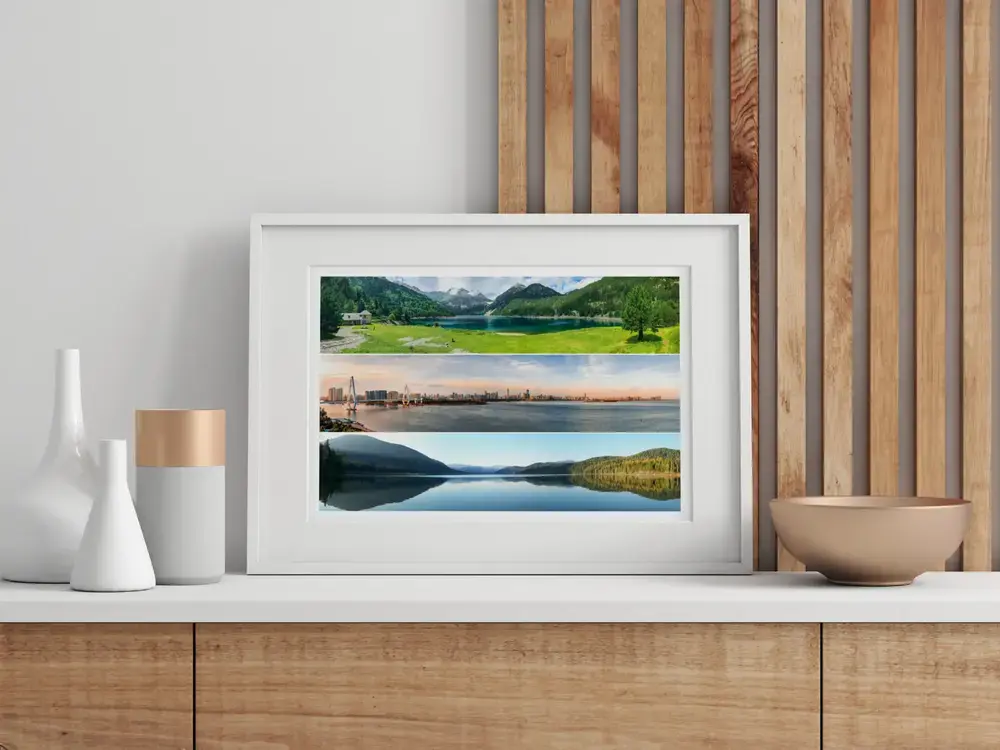 Collage photo de lacs et de ville en cadre blanc sur un buffet en bois, un souvenir de voyage à offrir
