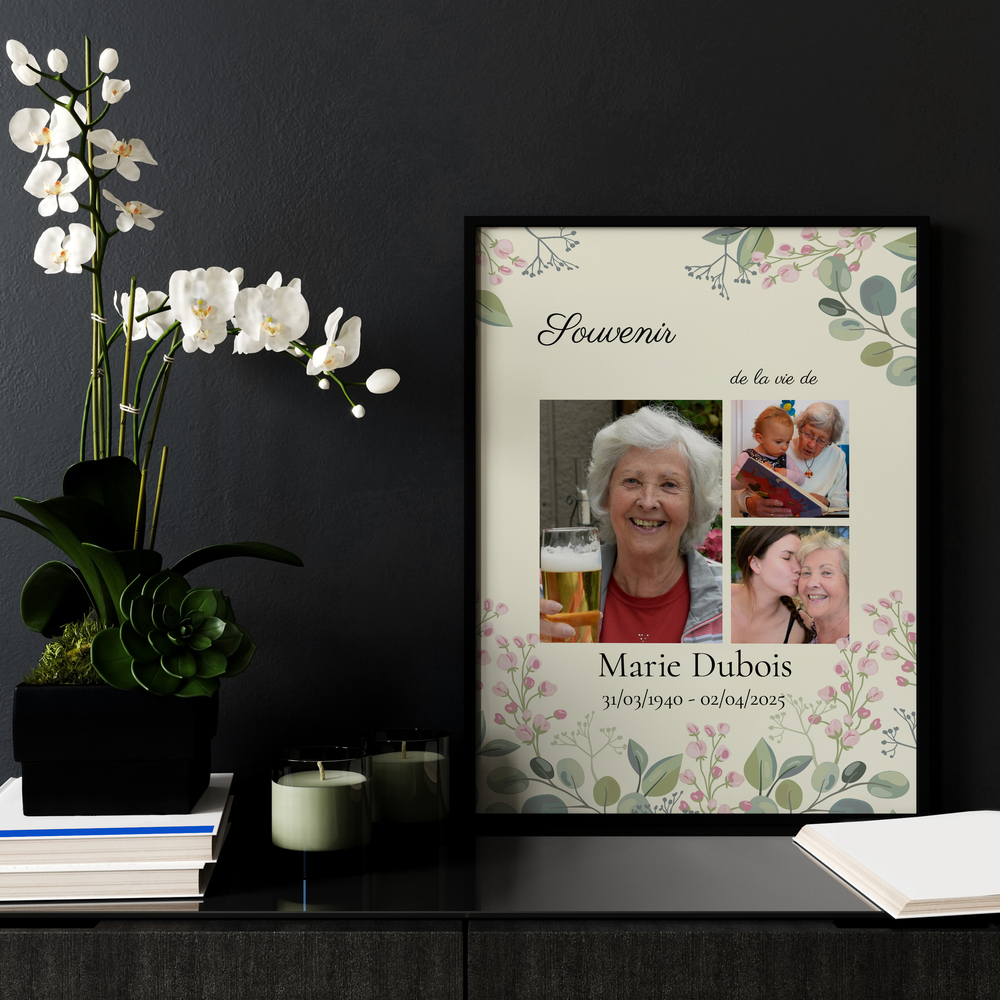 Collage photo de deuil fleuri dans un cadre noir, posé sur un meuble près d’orchidées blanches et de bougies